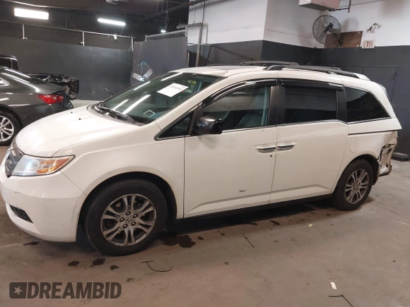 2013 Honda Odyssey EX-L with VIN 5FNRL5H66DB071151, listed as a IAAI auction lot 41914345 with 194,804 mi miles and . Bid and sale history available at carsss.com. Image 14.