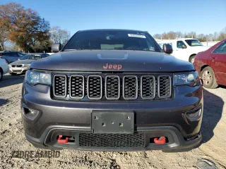 2021 Jeep Grand Cherokee Trailhawk with VIN 1C4RJFLG5MC627975, listed as a Copart auction lot 83080204 with 83,642 mi miles and Salvage Title. Bid and sale history available at carsss.com. Image 5.