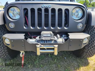 2014 Jeep Wrangler Unlimited Sport with VIN 1C4HJWDG4EL159619, listed as a IAAI auction lot 42176313 with 79,715 mi miles and . Bid and sale history available at DreamBid. Image 6.
