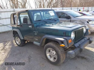 2001 Jeep Wrangler Sport with VIN 1J4FA49S31P317597, listed as a IAAI auction lot 41839524 with 145,164 mi miles. Bid and sale history available at carsss.com. Image 1.