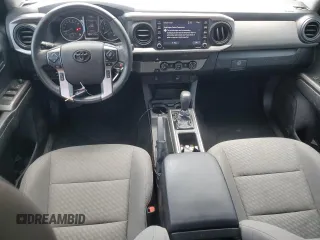 2022 Toyota Tacoma SR with VIN 3TYAX5GN2NT046114, listed as a Copart auction lot 61281875 with 57,726 mi miles and Salvage title. Bid and sale history available at DreamBid. Image 8.