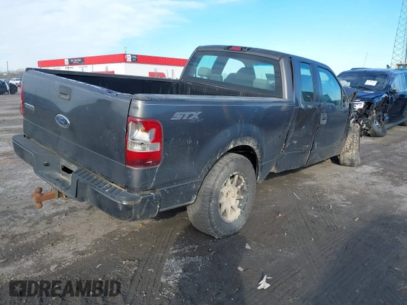 2005 Ford F-150 STX with VIN 1FTRX14W05FB27858, listed as a IAAI auction lot 41300421 with 225,035 mi miles. Bid and sale history available at carsss.com. Image 4.