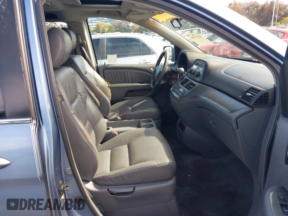 2006 Honda Odyssey EX-L z VIN 5FNRL38706B075356, wystawiony jako IAAI lot #42021960 z przebiegiem 120 455 mil mil oraz . Historia ofert i sprzedaży dostępna na DreamBid. Obrazek 5.