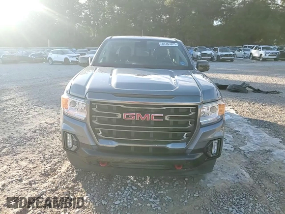 2021 GMC Canyon 4WD AT4 w/Leather with VIN 1GTG6FEN7M1156069, listed as a Copart auction lot 89345225 with 66,164 mi miles and Salvage Title. Bid and sale history available at carsss.com. Image 11.
