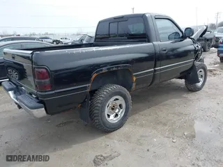 2001 Dodge Ram 1500 with VIN 1B7HF16Z31S144662, listed as a IAAI auction lot 41930146 with 104,146 mi miles. Bid and sale history available at carsss.com. Image 4.