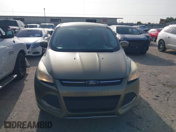 2013 Ford Escape SE z VIN 1FMCU0GX2DUD94471, wystawiony jako IAAI lot #42655476 z przebiegiem 146 578 mil mil oraz . Historia ofert i sprzedaży dostępna na DreamBid. Obrazek 6.