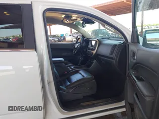 2018 GMC Canyon 4WD Denali z VIN 1GTP6EE11J1178961, wystawiony jako IAAI lot #42499884 z przebiegiem 71 309 mil mil oraz . Historia ofert i sprzedaży dostępna na DreamBid. Obrazek 5.