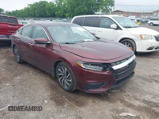 2020 Honda Insight Touring z VIN 19XZE4F93LE010040, wystawiony jako IAAI lot #42240572 z przebiegiem 52 299 mil mil oraz . Historia ofert i sprzedaży dostępna na DreamBid. Obrazek 1.