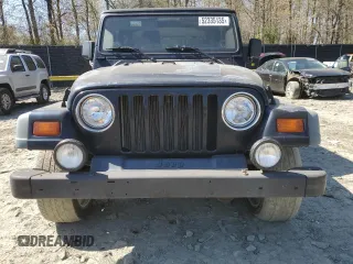 1997 Jeep Wrangler Sport with VIN 1J4FY19SXVP514573, listed as a Copart auction lot 52335135 with 89,479 mi miles and Clean Title. Bid and sale history available at carsss.com. Image 5.