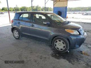 2009 Scion xD z VIN JTKKU10419J046166, wystawiony jako Copart lot #56123435 z przebiegiem 184 030 mil mil oraz Szkoda całkowita • Salvage title. Historia ofert i sprzedaży dostępna na DreamBid. Obrazek 4.