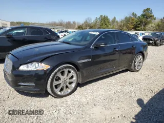2012 Jaguar XJ with VIN SAJWA1CB5CLV29023, listed as a Copart auction lot 48300165 with 42,725 mi miles and Salvage Title. Bid and sale history available at DreamBid. Image 1.