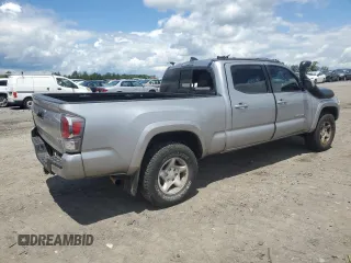 2020 Toyota Tacoma SR5 with VIN 3TMDZ5BN5LM090020, listed as a Copart auction lot 58192835 with 107,156 mi miles and Salvage title. Bid and sale history available at DreamBid. Image 3.