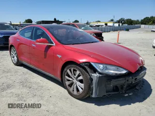 2014 Tesla Model S 60 with VIN 5YJSA1H17EFP64266, listed as a Copart auction lot 61678485 with 104,160 mi miles and Salvage title. Bid and sale history available at DreamBid. Image 4.