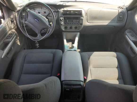 2002 Ford Explorer Sport Trac Value с VIN 1FMZU77E02UC24219, выставлен на аукционе Copart как лот 60695915 с пробегом 102 208 миль миль и Чистый • Clean title. История ставок и продаж доступна на DreamBid. Изображение 8.