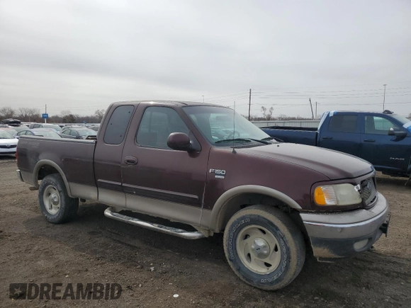 2001 Ford F-150 XL with VIN 1FTRX18L61NB40999, listed as a Copart auction lot 49641305 with 216,452 mi miles and Salvage Title. Bid and sale history available at carsss.com. Image 4.