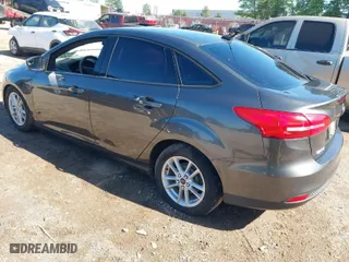 2015 Ford Focus SE with VIN 1FADP3F24FL219760, listed as a IAAI auction lot 41947221 with 163,259 mi miles. Bid and sale history available at carsss.com. Image 3.