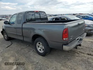 2003 Ford F-150 XL with VIN 1FTRX17L43NA66874, listed as a Copart auction lot 50741395 with 196,161 mi miles and Salvage title. Bid and sale history available at DreamBid. Image 2.