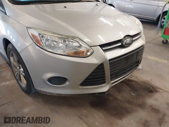 2013 Ford Focus SE z VIN 1FADP3F24DL277767, wystawiony jako IAAI lot #41562390 z przebiegiem 183 322 mil mil oraz . Historia ofert i sprzedaży dostępna na DreamBid. Obrazek 6.