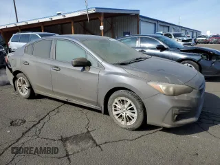 2017 Subaru Impreza Premium with VIN 4S3GKAD65H3623718, listed as a Copart auction lot 45234335 with 79,690 mi miles and Salvage title. Bid and sale history available at DreamBid. Image 4.