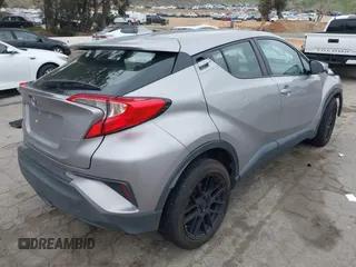 2018 Toyota C-HR XLE with VIN NMTKHMBX4JR023586, listed as a IAAI auction lot 41890863 with 86,958 mi miles and . Bid and sale history available at DreamBid. Image 4.