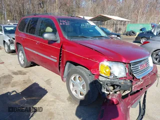 2006 GMC Envoy SLE with VIN 1GKDT13S062267555, listed as a IAAI auction lot 41850018 with 199,196 mi miles. Bid and sale history available at carsss.com. Image 1.
