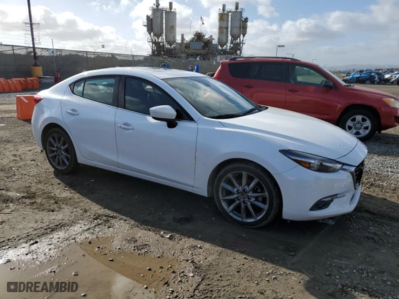 2018 Mazda Mazda3 4-Door Grand Touring with VIN 3MZBN1W39JM163033, listed as a Copart auction lot 48961255 with 119,488 mi miles and Clean Title. Bid and sale history available at carsss.com. Image 4.