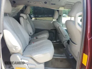 2012 Toyota Sienna XLE AAS z VIN 5TDYK3DC9CS243892, wystawiony jako Copart lot #61198555 z przebiegiem 129 061 mil mil oraz Nie do naprawy • Non repairable. Historia ofert i sprzedaży dostępna na DreamBid. Obrazek 11.