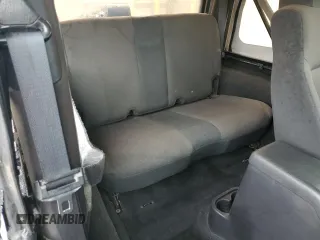 2006 Jeep Wrangler X with VIN 1J4FA39SX6P719070, listed as a Copart auction lot 55598455 with 110,741 mi miles and Salvage title. Bid and sale history available at DreamBid. Image 11.