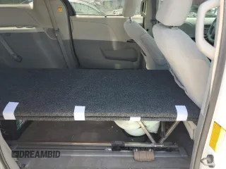 2012 Toyota Sienna LE с VIN 5TDJK3DC2CS044393, выставлен на аукционе Copart как лот 63579595 с пробегом 152 636 миль миль и Списание • Salvage title. История ставок и продаж доступна на DreamBid. Изображение 11.