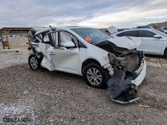 2014 Honda Odyssey EX-L with VIN 5FNRL5H67EB067093, listed as a Copart auction lot 87693205 with 0 mi miles and Salvage Title. Bid and sale history available at carsss.com. Image 13.