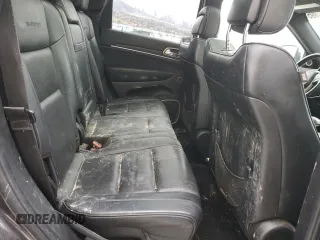 2014 Jeep Grand Cherokee Summit с VIN 1C4RJFJG4EC427075, выставлен на аукционе Copart как лот 49504095 с пробегом 147 342 миль миль и Списание • Salvage title. История ставок и продаж доступна на DreamBid. Изображение 11.
