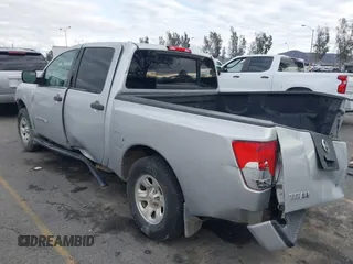 2005 Nissan Titan SE with VIN 1N6AA07B85N572434, listed as a IAAI auction lot 41526698 with 201,138 mi miles. Bid and sale history available at carsss.com. Image 3.