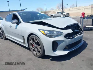2018 Kia Stinger GT1 with VIN KNAE45LC7J6034168, listed as a IAAI auction lot 41979658 with 111,854 mi miles. Bid and sale history available at carsss.com. Image 1.