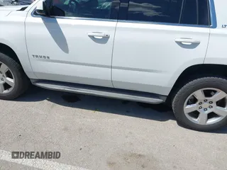 2015 Chevrolet Tahoe LT with VIN 1GNSKBKC8FR194164, listed as a IAAI auction lot 42315215 with 211,797 mi miles and . Bid and sale history available at DreamBid. Image 17.