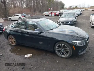 2018 BMW 4 Series 430i xDrive with VIN WBA4J3C56JBG91516, listed as a IAAI auction lot 41824273 with 102,932 mi miles and . Bid and sale history available at DreamBid. Image 13.