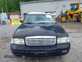 2009 Ford Police Interceptor z VIN 2FAHP71VX9X143897, wystawiony jako IAAI lot #41443264 z przebiegiem Nie podano mil oraz . Historia ofert i sprzedaży dostępna na DreamBid. Obrazek 11.