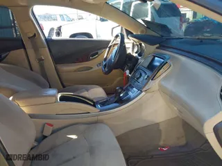 2012 Buick LaCrosse Convenience with VIN 1G4GB5E32CF275083, listed as a IAAI auction lot 41020528 with 148,082 mi miles. Bid and sale history available at carsss.com. Image 5.