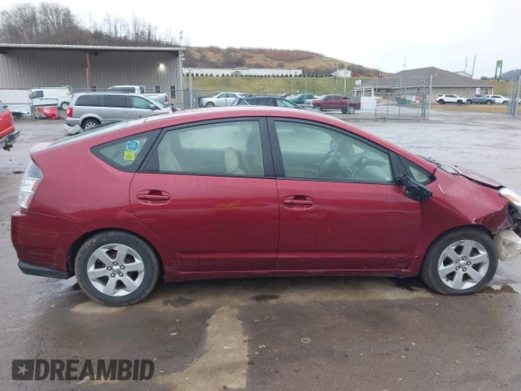 2005 Toyota Prius with VIN JTDKB20UX57037797, listed as a IAAI auction lot 41792880 with 259,123 mi miles. Bid and sale history available at carsss.com. Image 14.