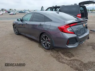 2018 Honda Civic Si z VIN 2HGFC1E59JH710458, wystawiony jako IAAI lot #42147386 z przebiegiem 89 650 mil mil oraz . Historia ofert i sprzedaży dostępna na DreamBid. Obrazek 3.