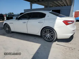 2018 Maserati Ghibli z VIN ZAM57XSAXJ1278606, wystawiony jako Copart lot #55722585 z przebiegiem 50 007 mil mil oraz Szkoda całkowita • Salvage title. Historia ofert i sprzedaży dostępna na DreamBid. Obrazek 2.