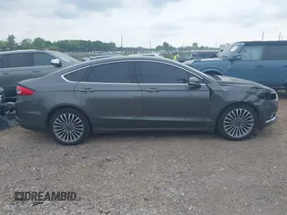 2017 Ford Fusion SE with VIN 3FA6P0T9XHR186017, listed as a IAAI auction lot 42535725 with 166,794 mi miles and . Bid and sale history available at DreamBid. Image 13.