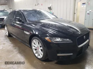 2017 Jaguar XF with VIN SAJBL4BV4HCY47941, listed as a Copart auction lot 77104404 with 73,839 mi miles and Salvage Title. Bid and sale history available at DreamBid. Image 4.