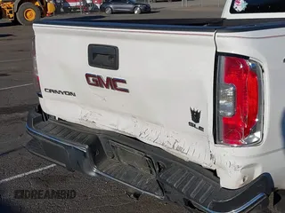 2016 GMC Canyon 4WD SLE with VIN 1GTH6CE30G1206140, listed as a IAAI auction lot 40799591 with 48,007 mi miles. Bid and sale history available at carsss.com. Image 6.