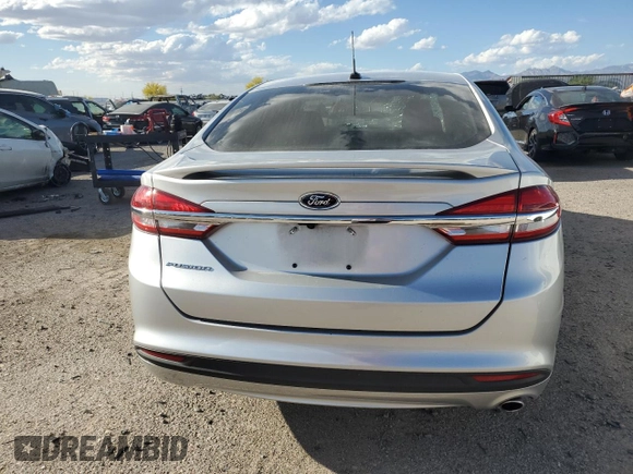 2018 Ford Fusion S z VIN 3FA6P0G77JR181212, wystawiony jako Copart lot #53244345 z przebiegiem 82 008 mil mil oraz Szkoda całkowita • Salvage title. Historia ofert i sprzedaży dostępna na DreamBid. Obrazek 6.