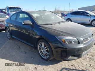 2008 Scion tC Spec with VIN JTKDE167480223045, listed as a IAAI auction lot 41590626 with 220,885 mi miles. Bid and sale history available at carsss.com. Image 1.