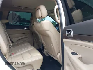 2018 Jeep Grand Cherokee Sterling with VIN 1C4RJEBG8JC289169, listed as a IAAI auction lot 42267113 with 77,274 mi miles and . Bid and sale history available at DreamBid. Image 8.
