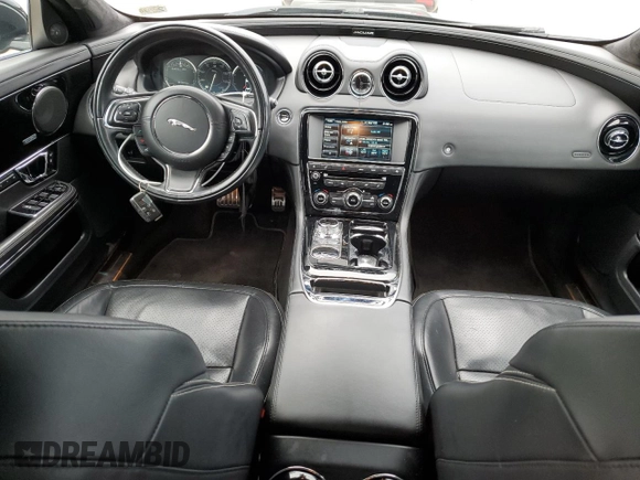 2015 Jaguar XJ with VIN SAJWA1CZ1F8V85402, listed as a Copart auction lot 86717734 with 201,249 mi miles and Salvage Title. Bid and sale history available at carsss.com. Image 8.