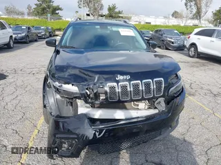 2019 Jeep Cherokee Latitude with VIN 1C4PJLCB8KD215423, listed as a IAAI auction lot 41911882 with 76,965 mi miles. Bid and sale history available at carsss.com. Image 12.
