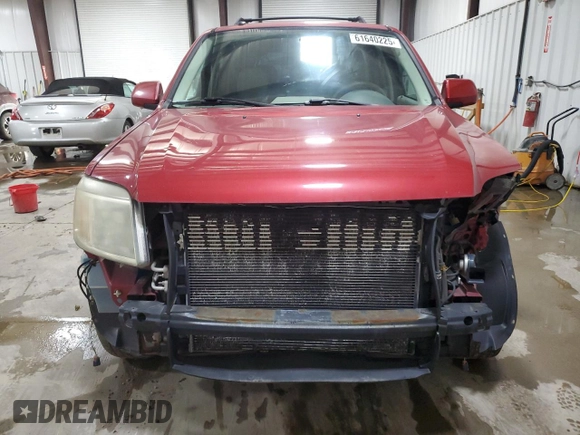 2008 Mercury Mariner Premier z VIN 4M2CU97118KJ52951, wystawiony jako Copart lot #61640225 z przebiegiem 186 109 mil mil oraz Szkoda całkowita • Salvage title. Historia ofert i sprzedaży dostępna na DreamBid. Obrazek 5.