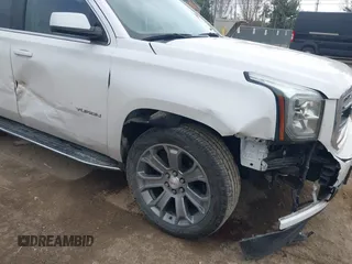 2019 GMC Yukon SLT with VIN 1GKS1BKCXKR329607, listed as a IAAI auction lot 41188239 with 84,940 mi miles. Bid and sale history available at carsss.com. Image 6.